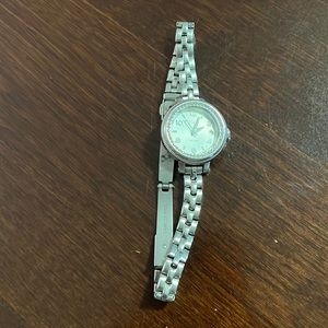 Gently used women’s watch with date.